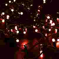Гирлянда "Нить". Красные диоды 100 шт, 10 метров, черный провод, постоянное свечение, 220 В